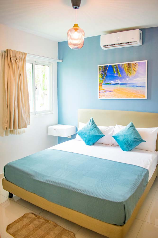Penthouse bedroom at Beach Apartamentos in Playa Palmera